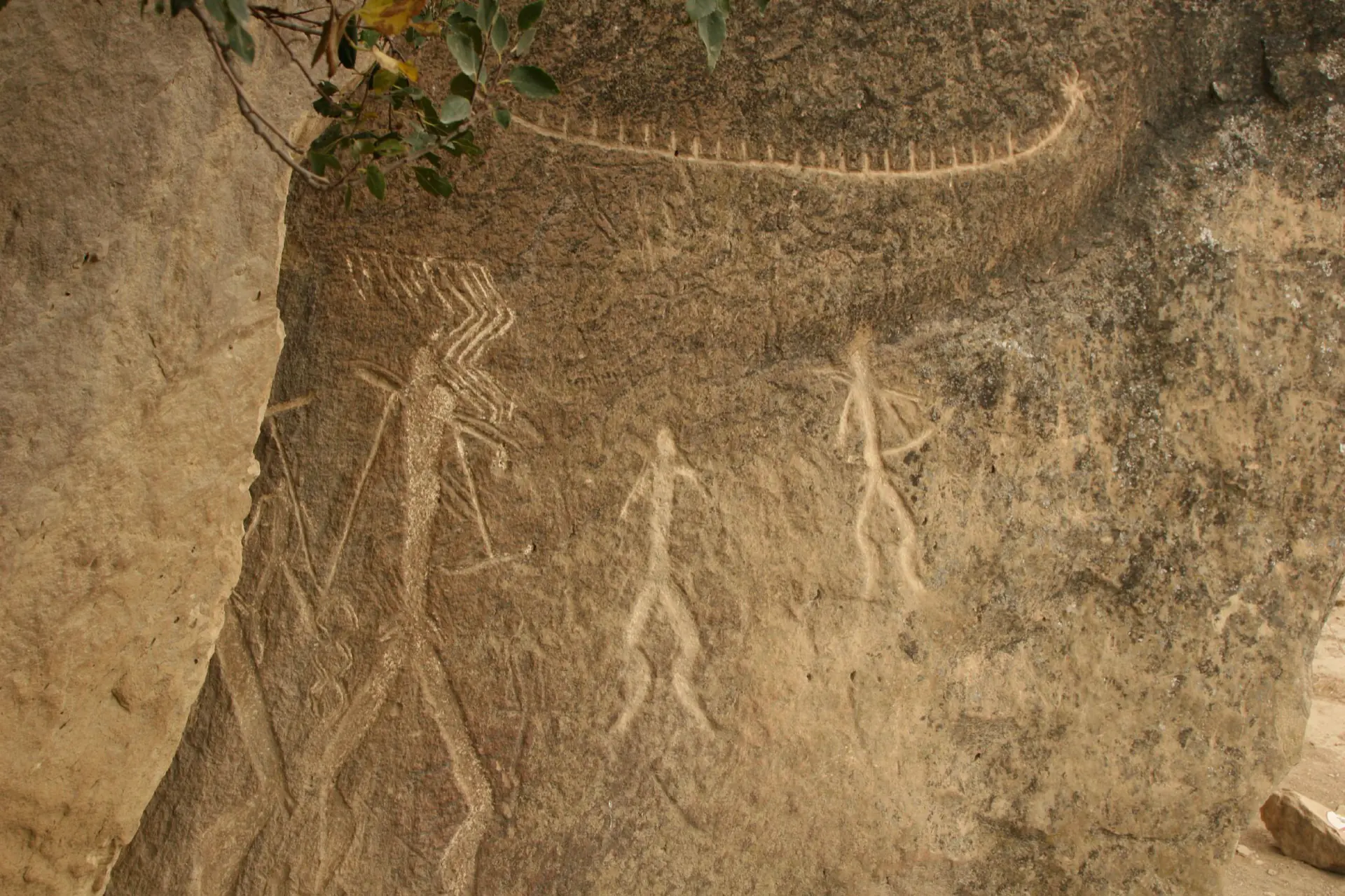 Human figures carved into rock at Gobustan, thousands of years old.