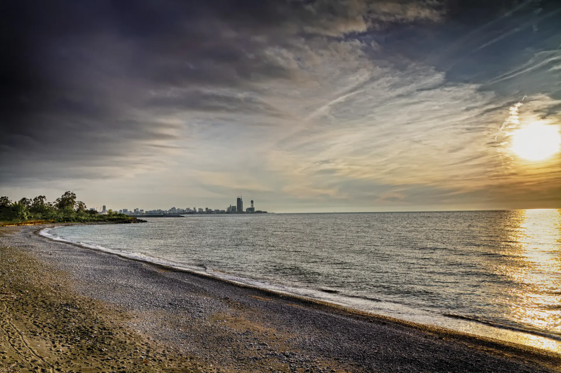 Batumi’s towers along the Black Sea shore seen from the green cape north of the city.