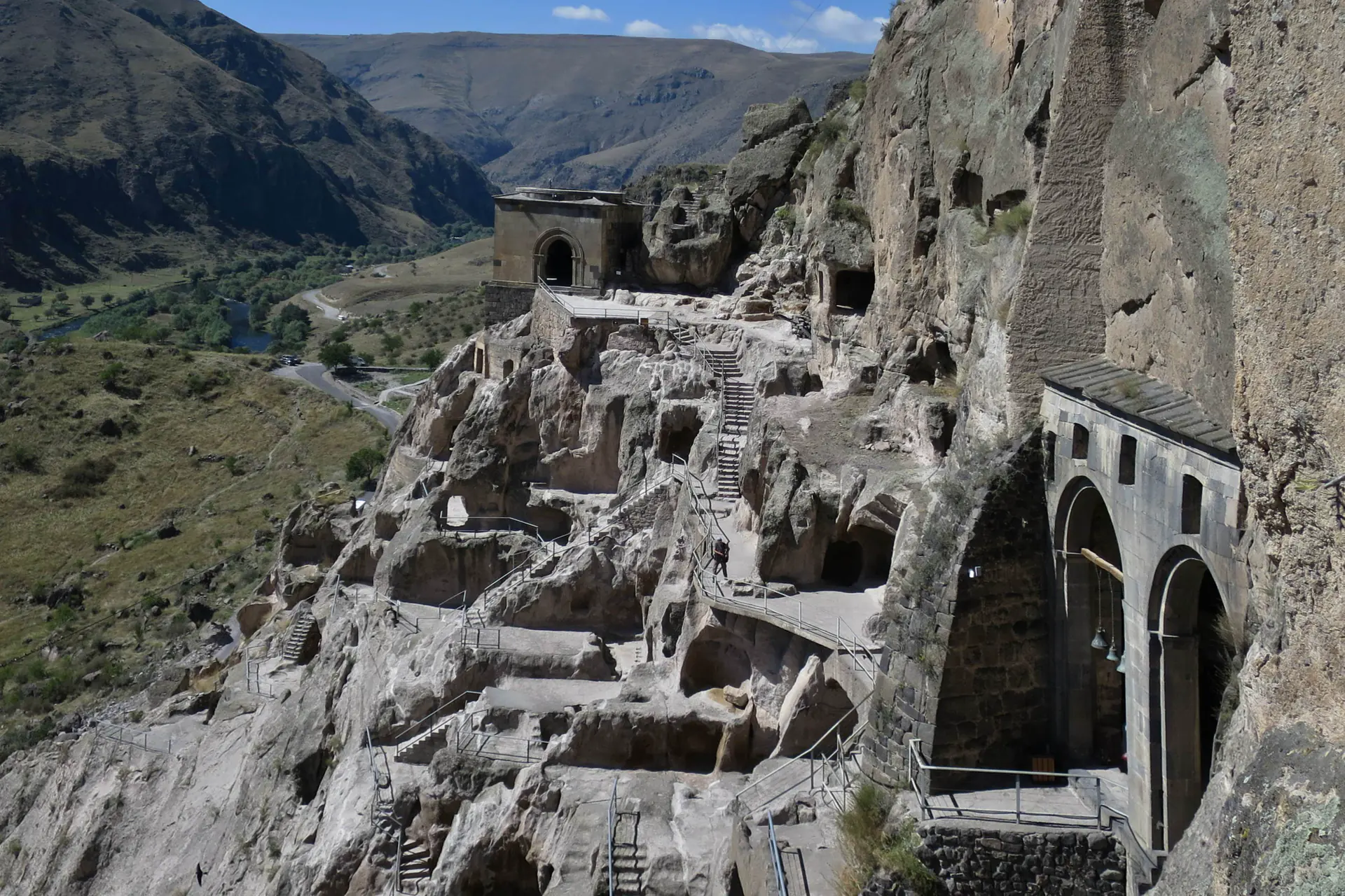 The cave city of Vardzia cut into the cliff face above the Mtkvari.