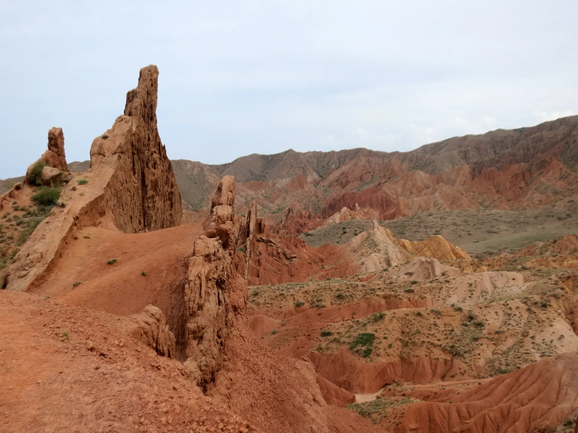 The red eroded spires of Skazka canyon on the south shore of Issyk-Kul.