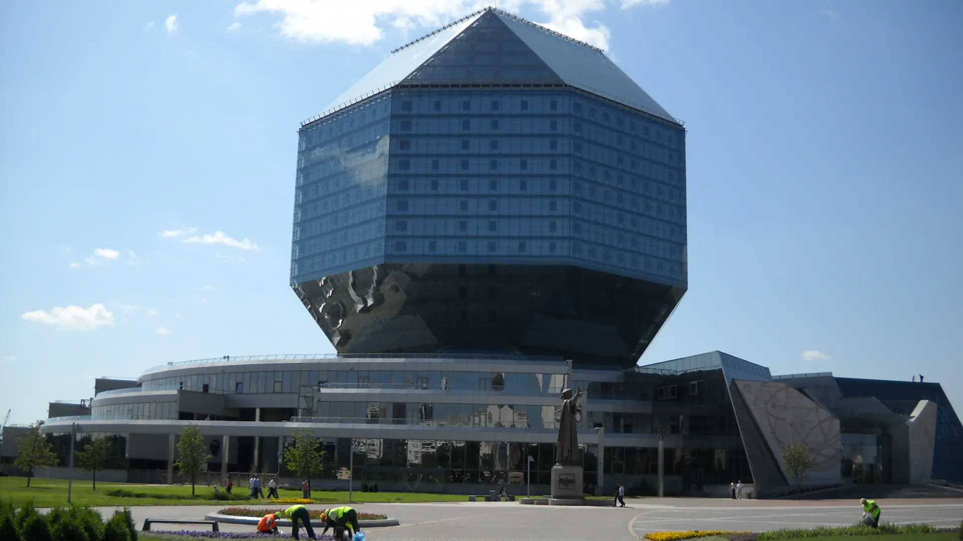 The rhomboid glass shell of the National Library of Belarus on its plaza.