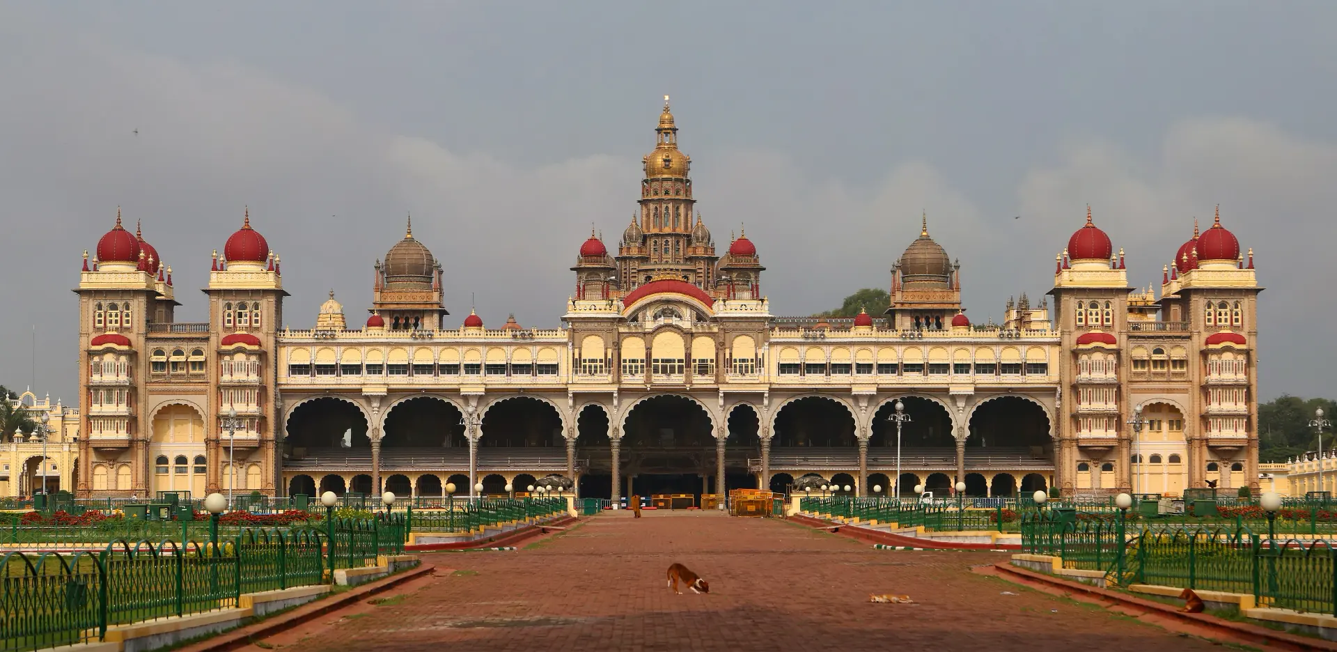 Mysore Palace in the morning, its domes and arcades in full sun.