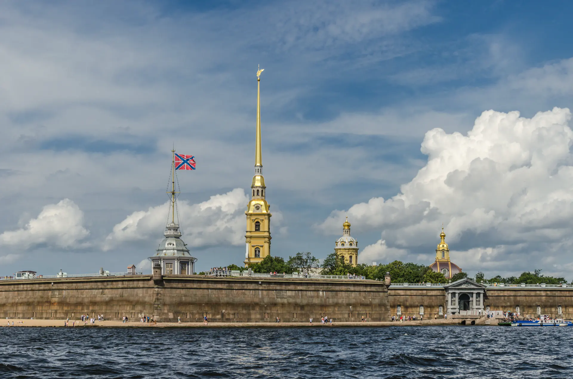 The gilded spire of the Peter and Paul Fortress cathedral above the Neva.