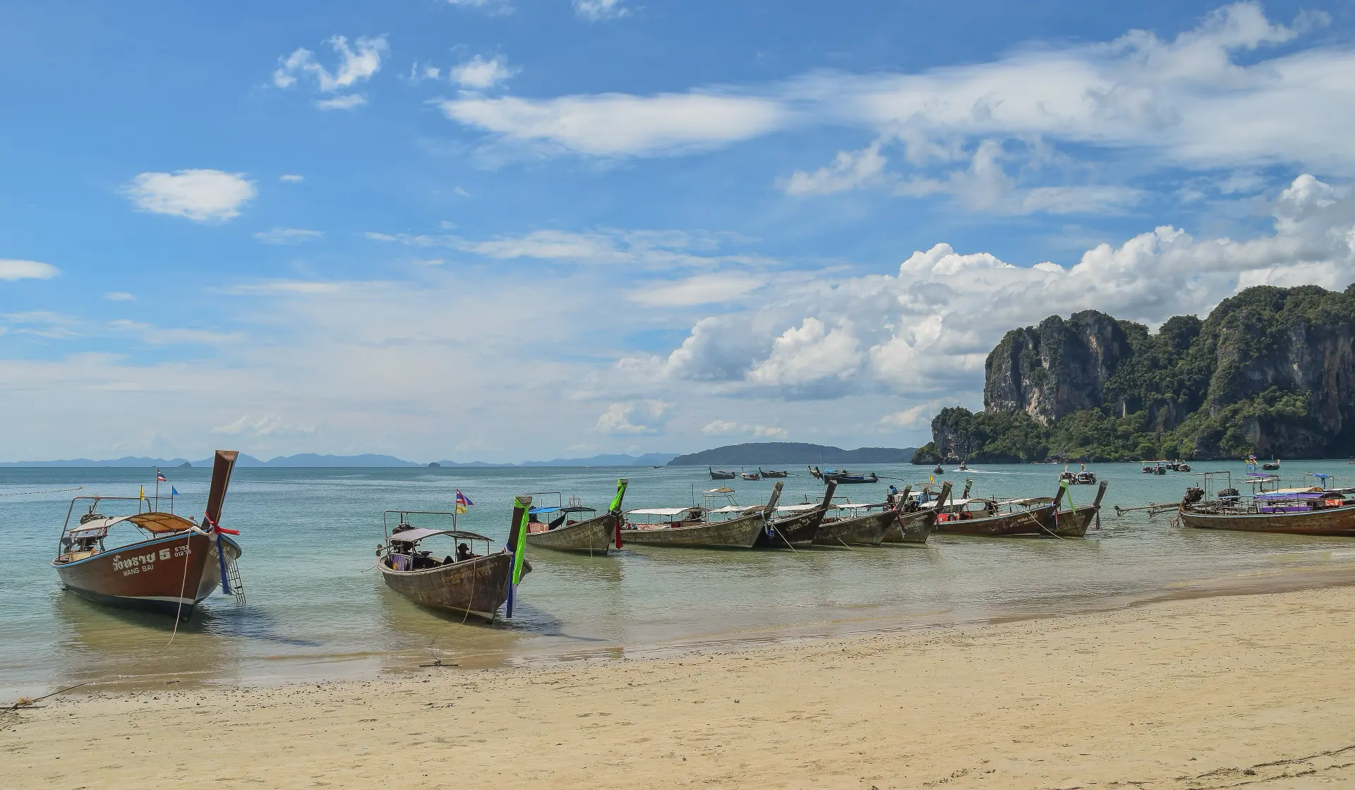 Limestone cliffs rising straight out of the sea at Railay in Krabi.