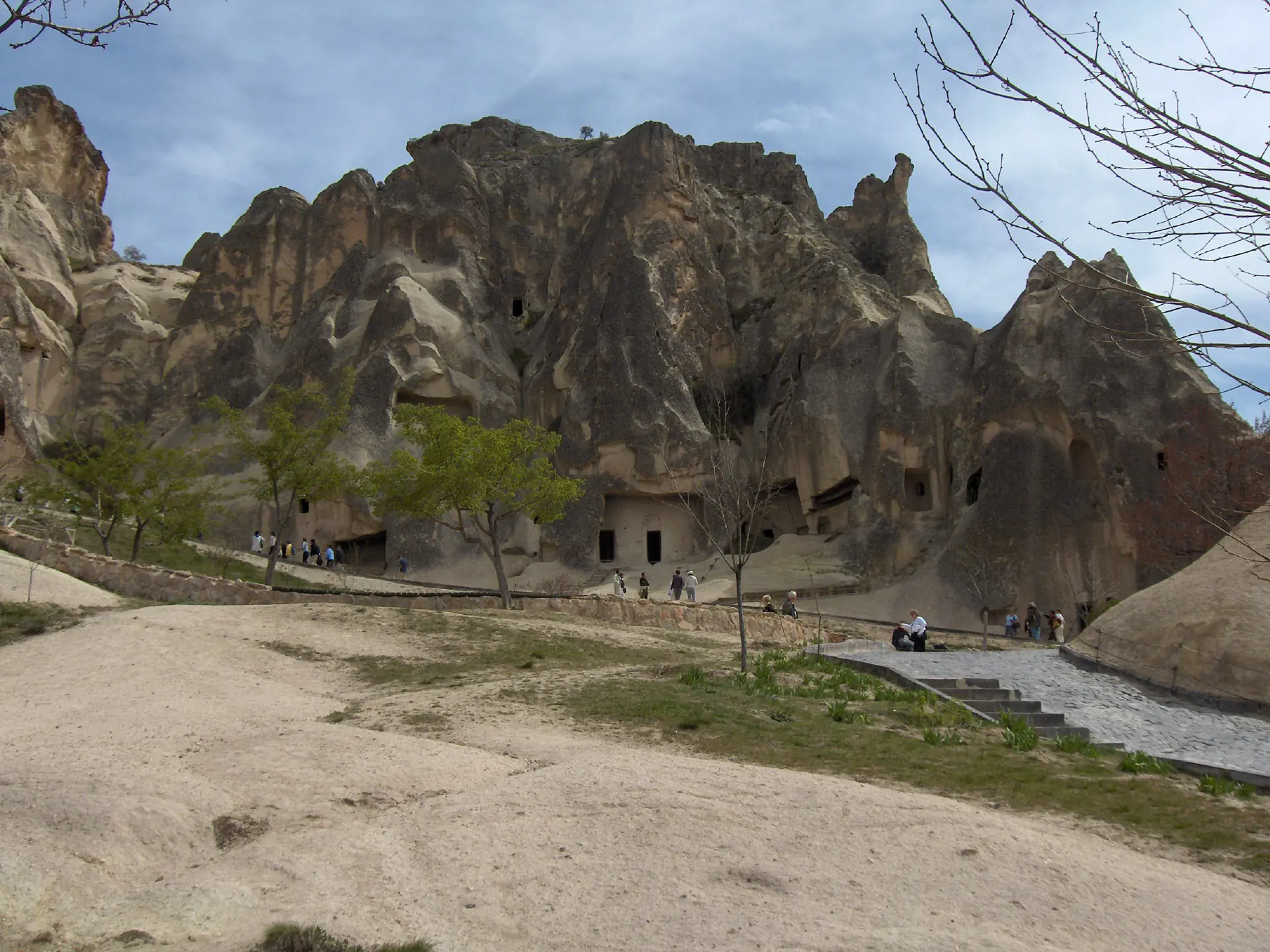 The rock-cut monastery complex at Göreme, cells carved into the tuff.